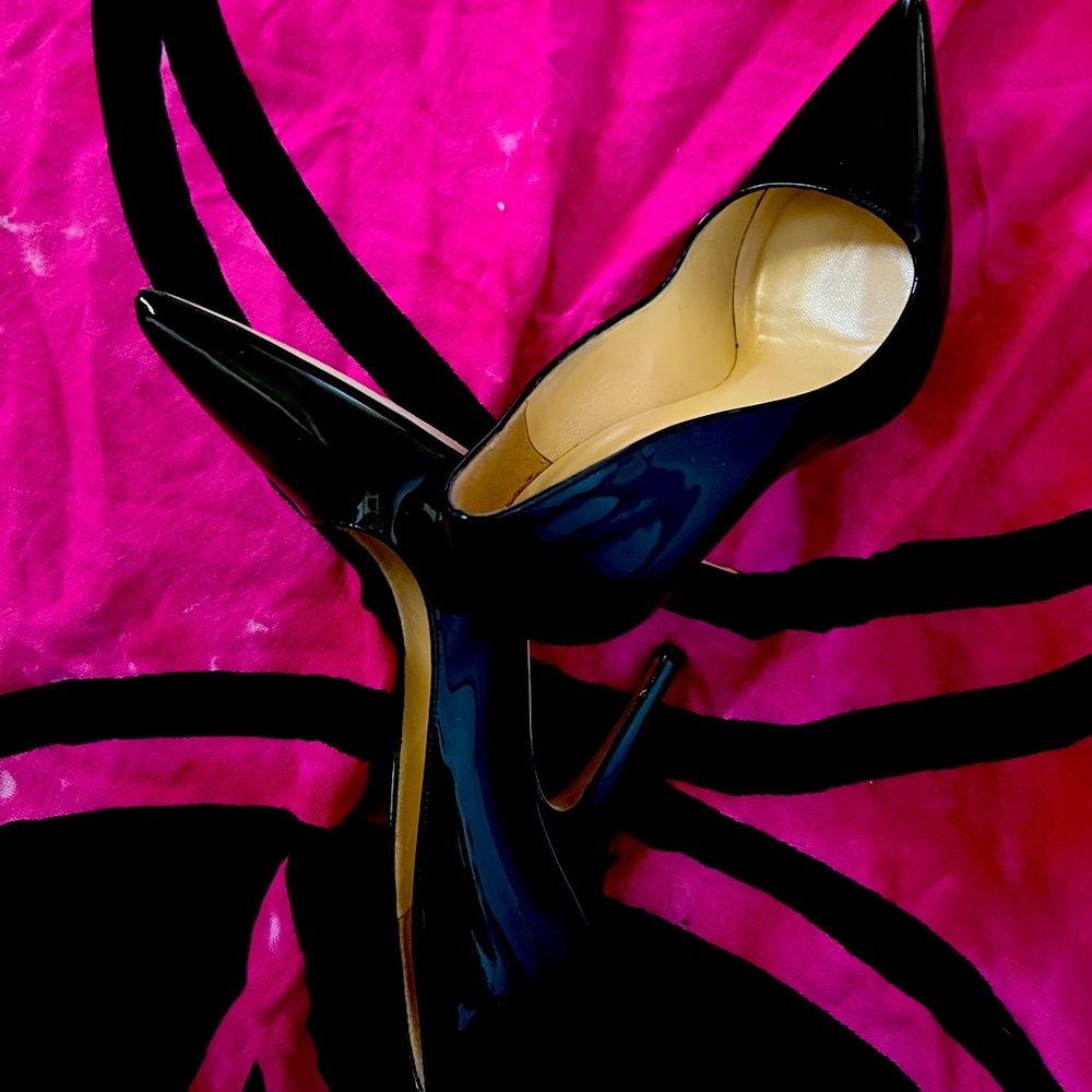 Kate Spade black patent pumps